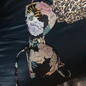 Swim suit top with flowers and tie strings in the back.